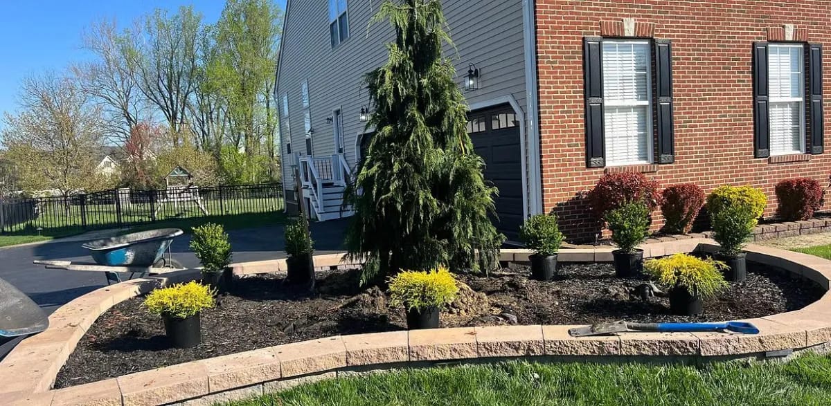 Stone retaining border and landscape bed
